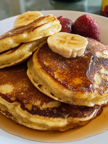 A plate of delicious French Toast Pancakes, perfect for a special and flavorful breakfast or brunch. Recipe by Goya Recipes